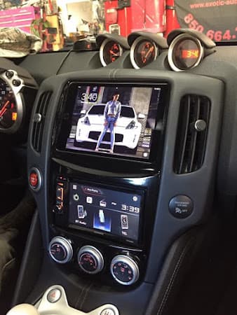 Dashboard with touchscreen and gauge pods at Exotic Car Audio in Mary Esther, Florida