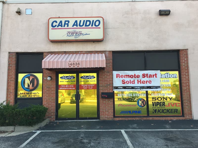 Storefront with Car Audio sign, brick facade, and Remote Start banner at MAS Auto Stereo in Woodbridge, Virginia