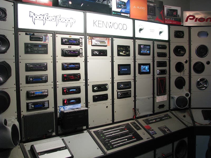 Wall of car stereo head units in display racks at Accutek Electronics in Merrillville, Indiana