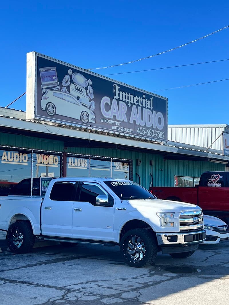 Storefront with roof sign and a white pickup parked out front at Imperial Car Audio in Oklahoma City, Oklahoma