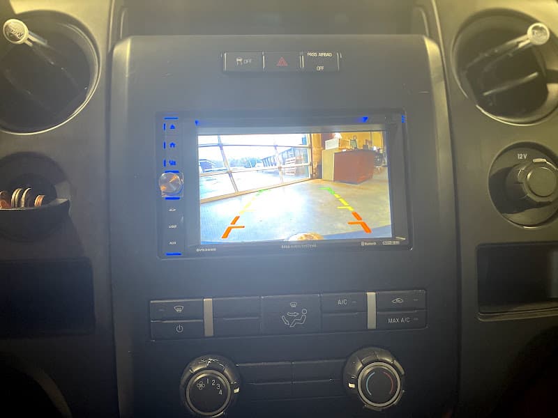 Double-DIN stereo showing a rear camera view in a dashboard at Boomer Mcloud in Middlebury, Connecticut
