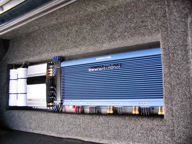 Soundstream amplifier mounted in a carpeted trunk compartment at Joe Bruno Designs in West Berlin, New Jersey