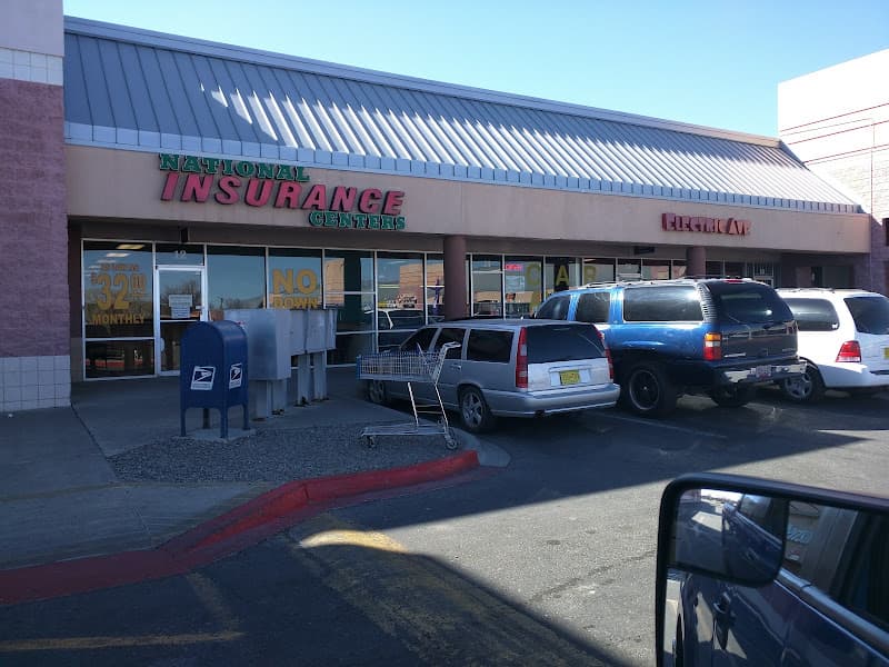 Strip mall storefront and parking lot at Electric Avenue Car Audio in Albuquerque, New Mexico