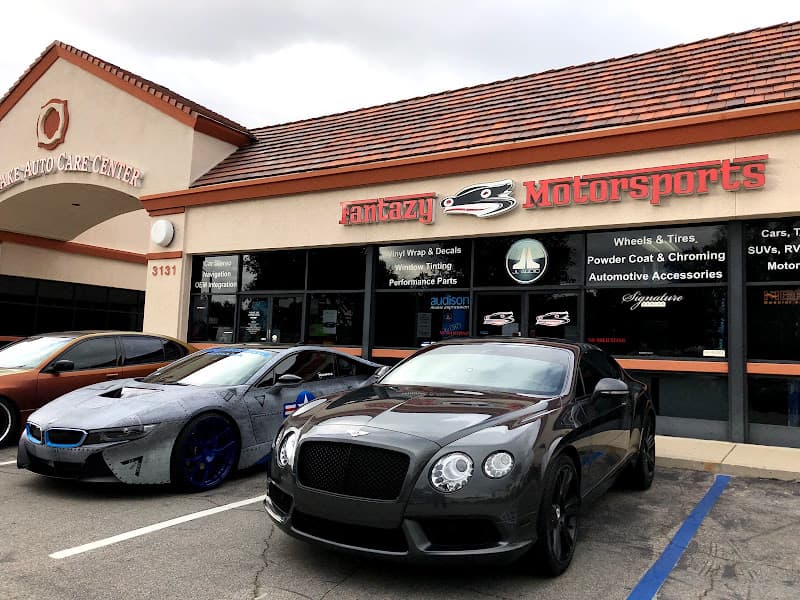 Storefront with BMW and Bentley cars at Fantazy Motorsports | PPF, Ceramic Pro, Car Wraps & Audio in Northridge, California