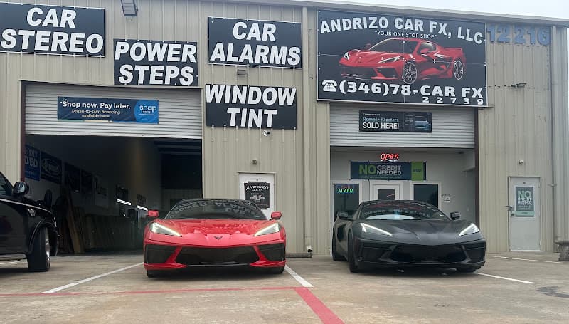 Storefront with car stereo, alarm and tint signs at Andrizo Car Fx in Houston, Texas