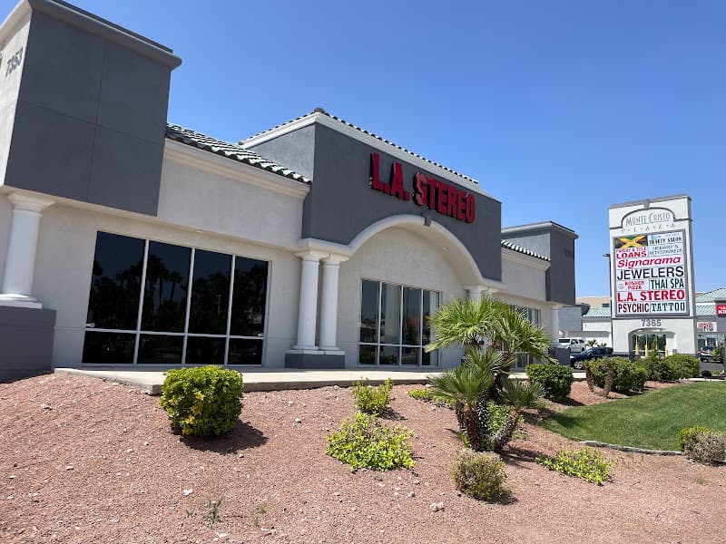 Storefront with red sign and tall glass windows at L A Stereo in Las Vegas, Nevada