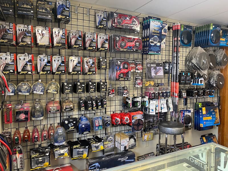 Wall display of Stinger products on wire racks at Sound Decision in Yorkville, Illinois