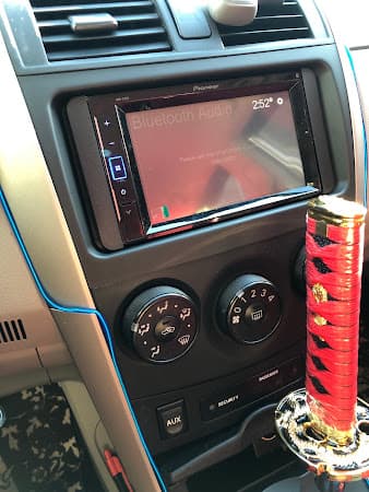 Pioneer touchscreen stereo installed in a car dashboard at Crazy Car Audio in College Park, Maryland