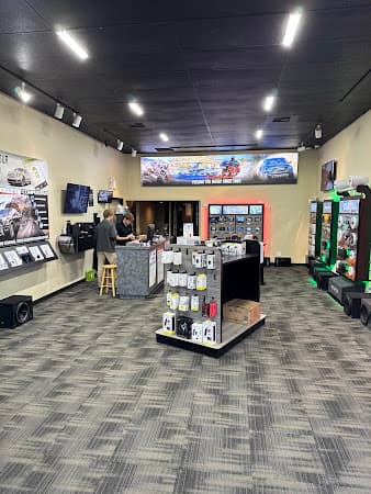 Store interior with two staff by a counter and wall displays at Aspen Sound in Spokane, Washington