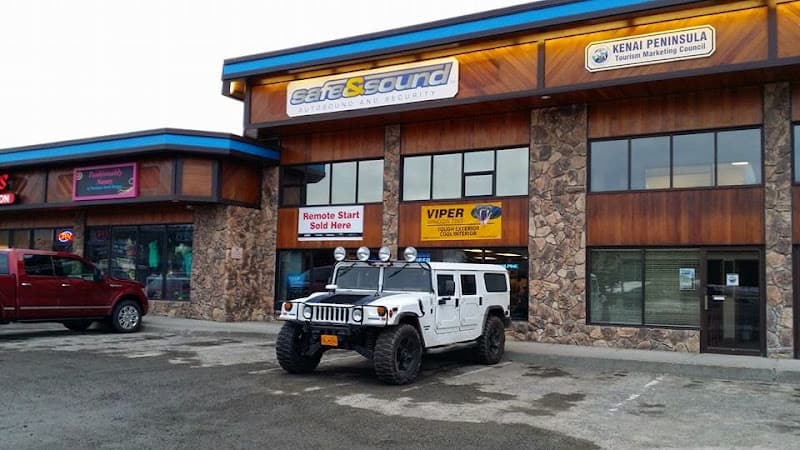 Storefront with white off-road SUV parked outside at Safe & Sound in Soldotna, Alaska