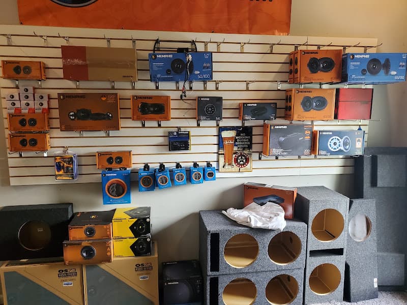 Slatwall display of Memphis speakers and subwoofer enclosures at Sound Decisions in Herrin, Illinois