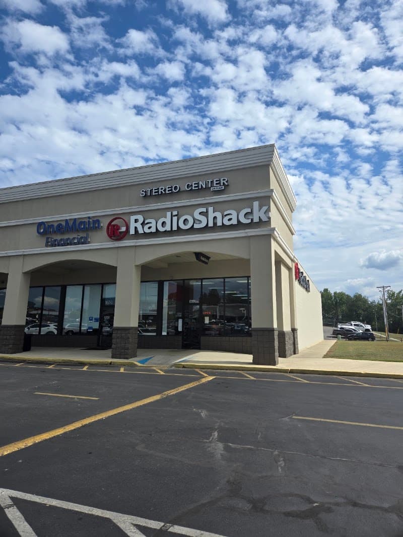Storefront with Stereo Center and RadioShack signs at Helms Stereo Center/RadioShack Dealer in Cullman, Alabama