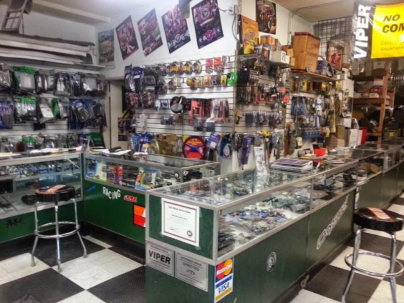 Glass cases of car audio parts and accessories inside a shop at OG'S Auto Accessories in Cathedral City, California