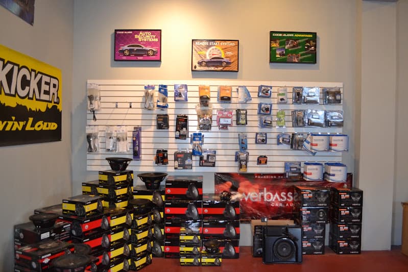 Store wall of car audio parts with stacked speaker boxes at Pro Tech Audio in Lake Charles, Louisiana