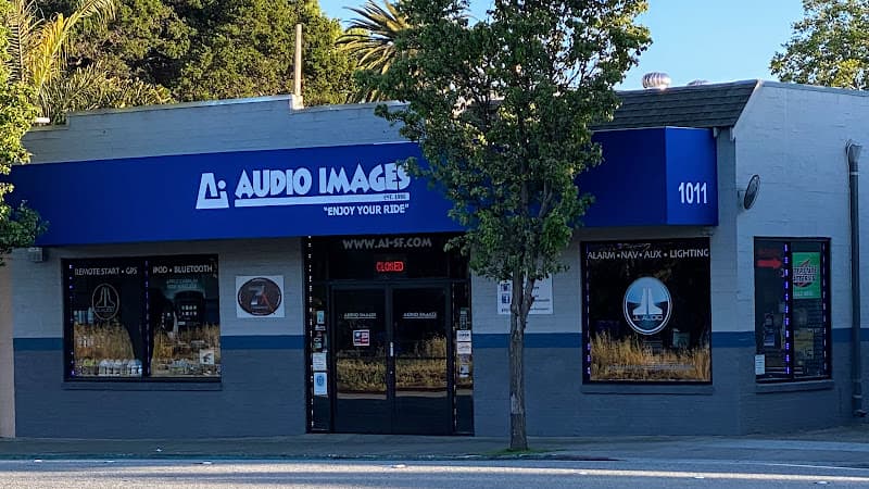 Blue storefront with window displays and entrance doors at Audio Images in Burlingame, California