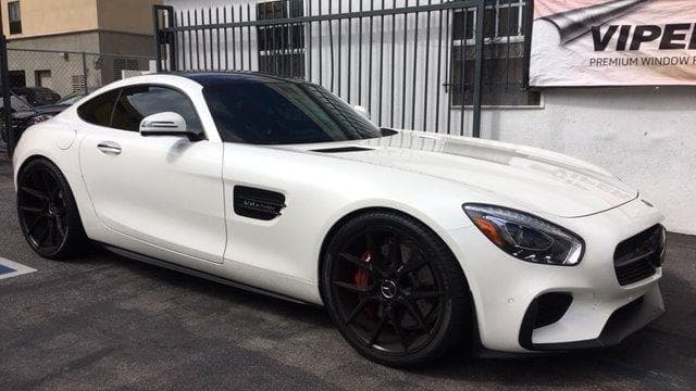 White Mercedes coupe with dark wheels at Santa Monica Car Sound & Window Tinting in Santa Monica, California