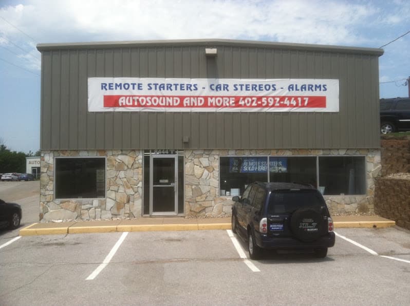 Storefront with stone base and remote starter banner at AutoSound & More in Omaha, Nebraska