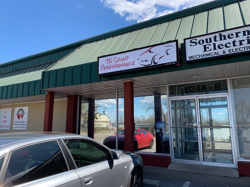 Storefront with green awning and sign at TN SoundPerformance in Murfreesboro, Tennessee