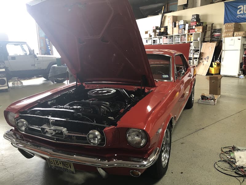 Red classic coupe with hood open and engine visible at Sound Auto in Hamilton Township, New Jersey